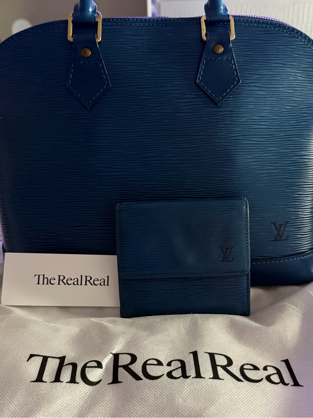 Bundle Of Louis Vuitton Blue Textured Top-Handle Satchel with a Gold Hardware🔥